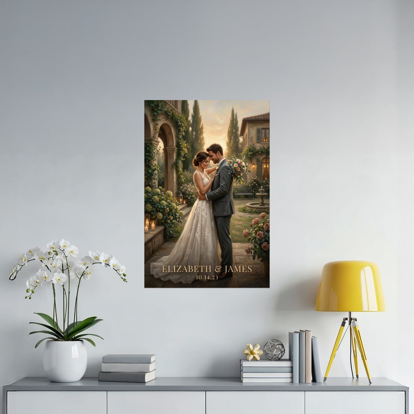 Wedding portrait of Elizabeth and James, dated 10.14.23, displayed on a wall.